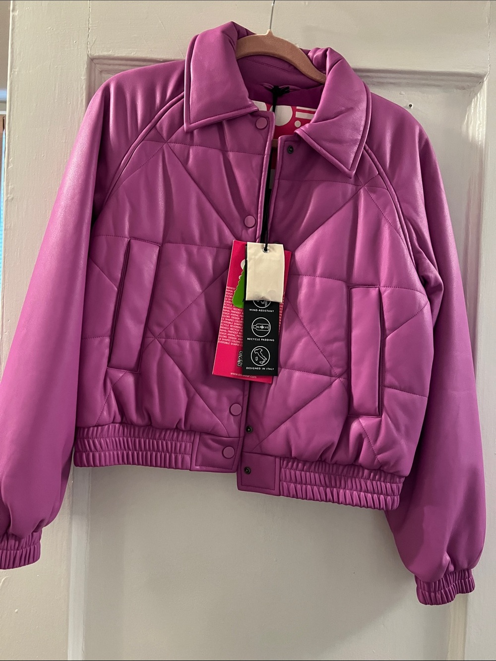 Cropped Quilted Puffer Jacket in Magenta